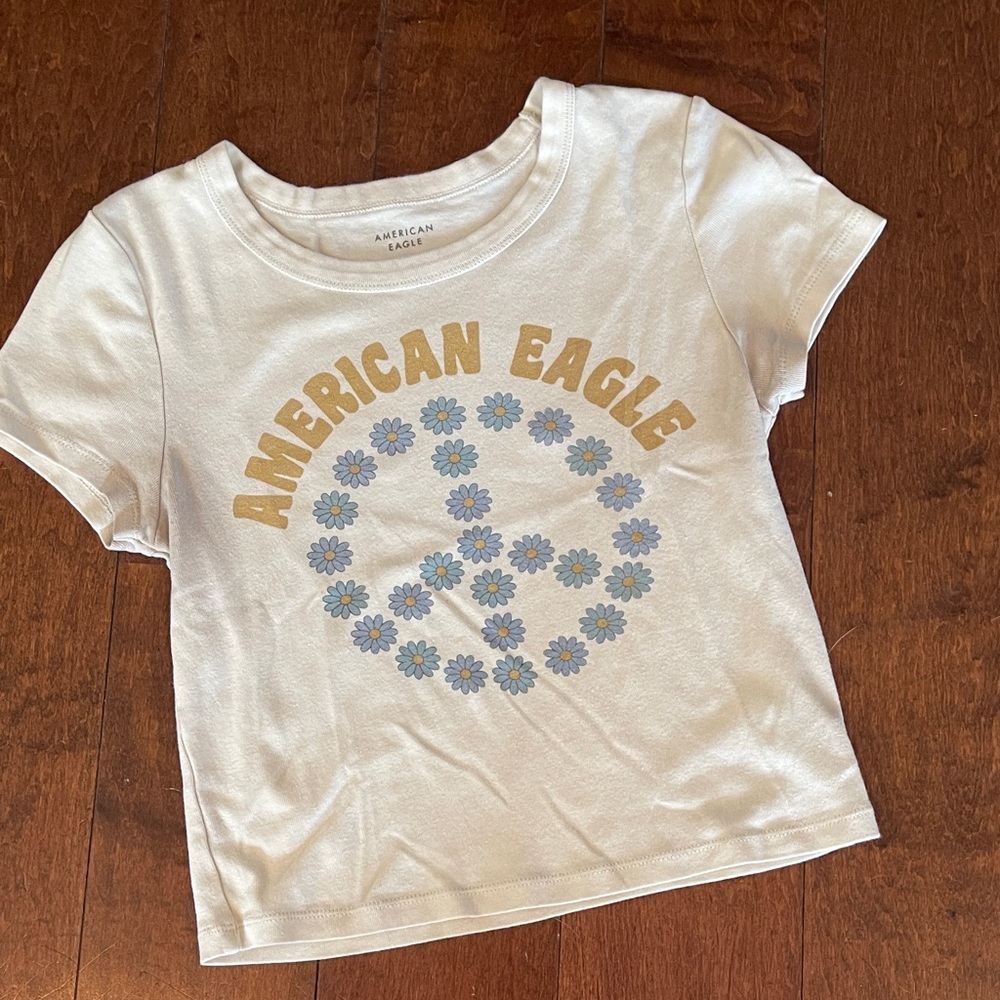 American Eagle Outfitters White Tee with Floral Peace Design